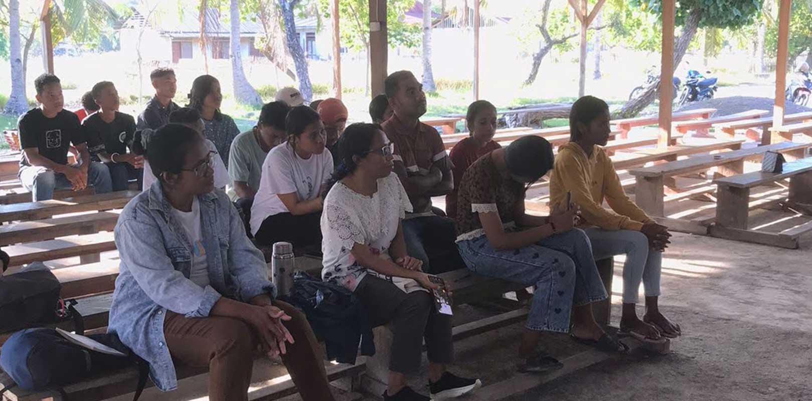 a volunteer taking class related to gender based violence